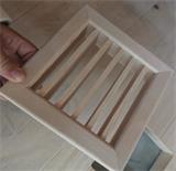 Grille d'aération en bois